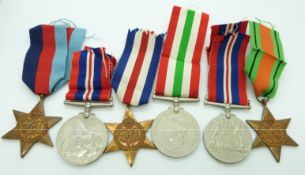 British Forces WWII boxed medals comprising 1939/1945 Star, France Italy Star and War Medal