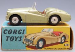 Corgi Toys diecast model Triumph T.R.3 Sports Car with metalic olive green body and red interior,