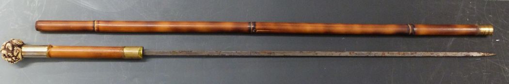 Bamboo swordstick with carved style knop, blade length 55cm
