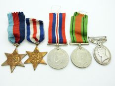 British Army WWII medals comprising 1939/1945 Star, France & Germany Star, Defence Medal, War
