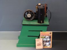 Stuart Turner model 400 stationary gas or petrol engine with open crank and spoked flywheel on