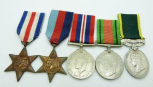 British Army WWII medals comprising 1939/1945 Star, France & Germany Star, Defence Medal, War