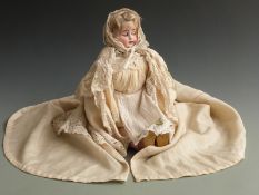 Continental bisque headed doll with open mouth, weighted blue eyes, short blonde hair and