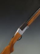 BSA 12 bore single barrelled folding poacher's shotgun with chequered semi-pistol grip and forend,