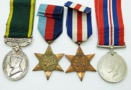 British Army WWII medals comprising 1939/1945 Star, France & Germany Star, War Medal and Territorial