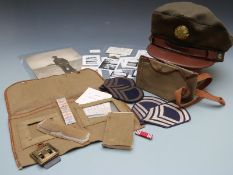 WWII United States small collection of ephemera for Chas Oscar Graf including cap, rank badges