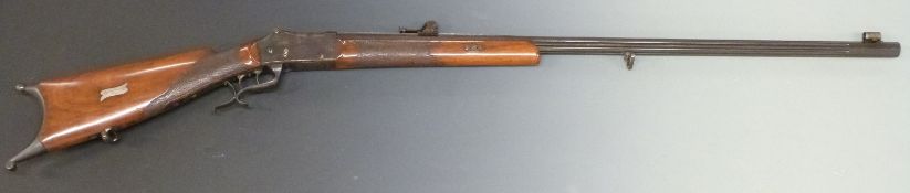 A Muller of Vevey Switzerland 10.4mm Martini action target rifle with chequered grip and forend,