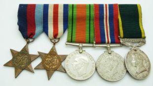 British Army WWII medals comprising 1939/1945 Star, France & Germany Star, Defence Medal, War