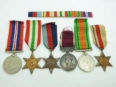 British Army WWII medals comprising 1939/1945 Star, Africa Star, Italy Star, Defence Medal, War