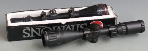 Two rifle scopes, one Simmons 4-16x40 in original box, the other 3-9x40 red/green mil-dot AO.