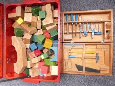 A vintage childs building / woodworking set together with a collection of wooden building blocks.