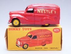 Dinky Toys diecast model Austin Van Nestlé with red body, yellow hubs and gold decals, 471, in