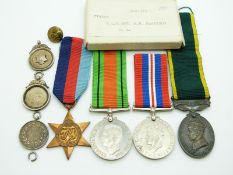 British Army WWII medals comprising 1939/1945 Star, Defence Medal, War Medal and Territorial