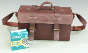 Leather cartridge bag containing 50 cartridges, 30g pigeon select fibre and two boxes of 30g