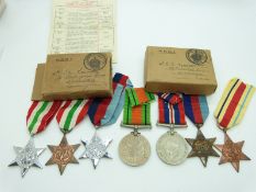 British Army WWII boxed medals comprising 1939/1945 Star, Africa Star, Defence Medal and War Medal