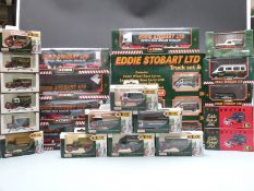 Twenty-four Corgi, Vanguards and Lledo diecast model Eddie Stobart vehicles and accessories