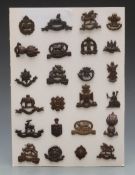 Display of 20 officers' OSD collar badges, Buffs, Black Watch, Warwickshire, Norfolk, HLI,