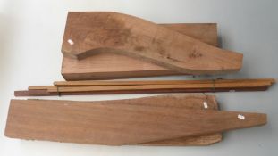 Four walnut stock blanks and four similar ram-rod blanks.