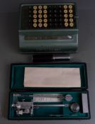 Otis King spiral slide rule, Ott planimeter and a Plus mechanical calculator