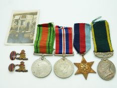 British Army WWII medals comprising 1939/1945 Star, Defence Medal, War Medal and Territorial