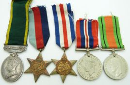 British Army WWII medals comprising 1939/1945 Star, France & Germany Star, Defence Medal, War