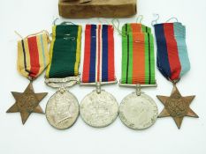 British Army WWII medals comprising 1939/1945 Star, Africa Star, Defence Medal, War Medal and