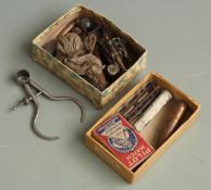 A collection of fired bullets, flints, pellets etc together with a miniature desk/ signal cannon,