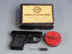 Webley Sports .22 starting pistol with named and chequered grips, in original box together with a