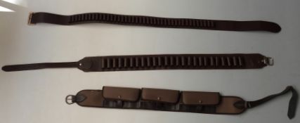 Three shotgun cartridge belts,  two brown leather for 12 bore and .410 and one Sacar.