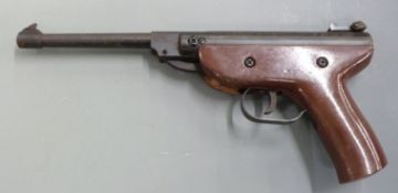 Westlake .177 air pistol with brown painted wood stock and adjustable iron sights, serial number