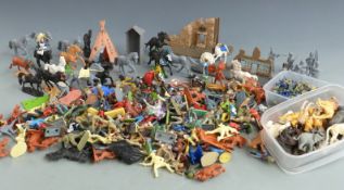 A collection of cowboy and Indian model figures and accessories including horses, buildings etc.