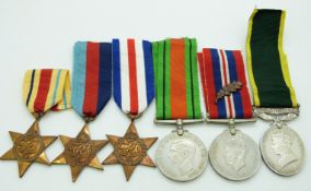 British Army WWII medals comprising 1939/1945 Star, France & Germany Star, Africa Star, Defence