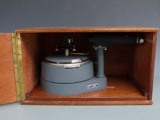 Griffin and George Limited cased spectrometer on slide out wooden panel, length 35cm