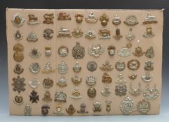 Display of 71 British Army cap badges for all Infantry battalions in existence at the start of WWI