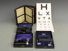 Three Theodore Hamblin Ltd, London cased optician's instruments together with an optician's test