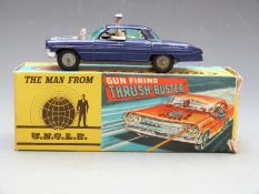 Corgi Toys diecast model The Man From UNCLE Gun Firing 'Thrush Buster' with purple body, lemon