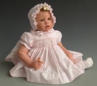 Lee Middleton Original Dolls limited edition doll with open mouth, fixed brown eyes and pink outfit,