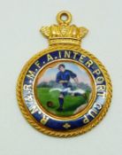 A 9ct gold and enamel RN & RMFA Inter-port Cup football medal, 7.1g