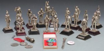 A collection of military figures including Churchill, pilot, Hussar etc 19 in total, 10cm high,