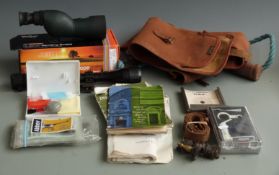 A collection of gun accessories including Vivitar 18-36x50 spotting scope in original box, Tasco