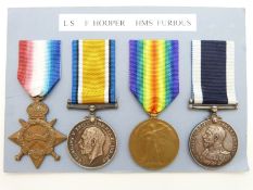 Royal Navy WWI medals comprising 1914/15 Star, War Medal and Victory Medal named to 26086 F Hooper