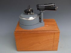 Griffin and George Limited cased spectrometer on slide out wooden panel, length 35cm