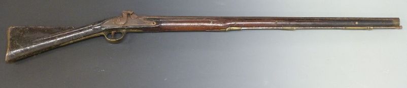 Percussion, converted from flintlock, hammer action Brown Bess gun with lock marked Tower and with
