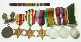 British Army WWII medals comprising 1939/1945 Star, Italy Star, Africa Star, Defence Medal, War