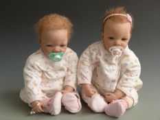 Two Ashton Drake Galleries So Truly Real dolls both with blue eyes, magnetic dummies and matching
