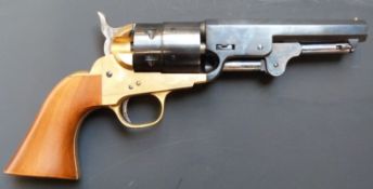 Six-shot single action blank firing revolver with brass frame, shaped wooden grips and 5 inch