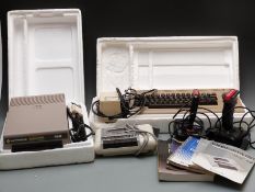 Commodore 64 personal computer with Datassette Unit, VIC1541 disk drive and two joysticks, some in