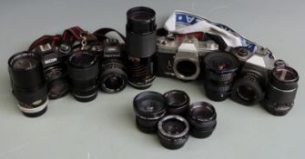 Four SLR cameras comprising Ricoh KR-10, Pentax Program A, Praktica MTL5B and Yashica FX-2 and