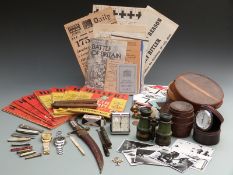 A collection of military items including German Mother's Cross, Mein Kampf magazine, Eastern