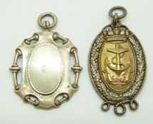 Two hallmarked silver Royal Navy football medals, one with anchor to front, both engraved verso, one